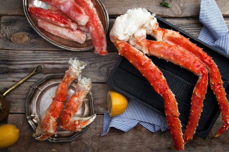 A dish of whole cooked crab legs